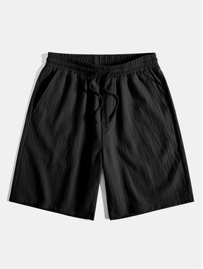 Geometric Jacquard Eyelet Cuban Shirt & Crinkled Textured Drawstring Shorts — North Row | Model Wearing