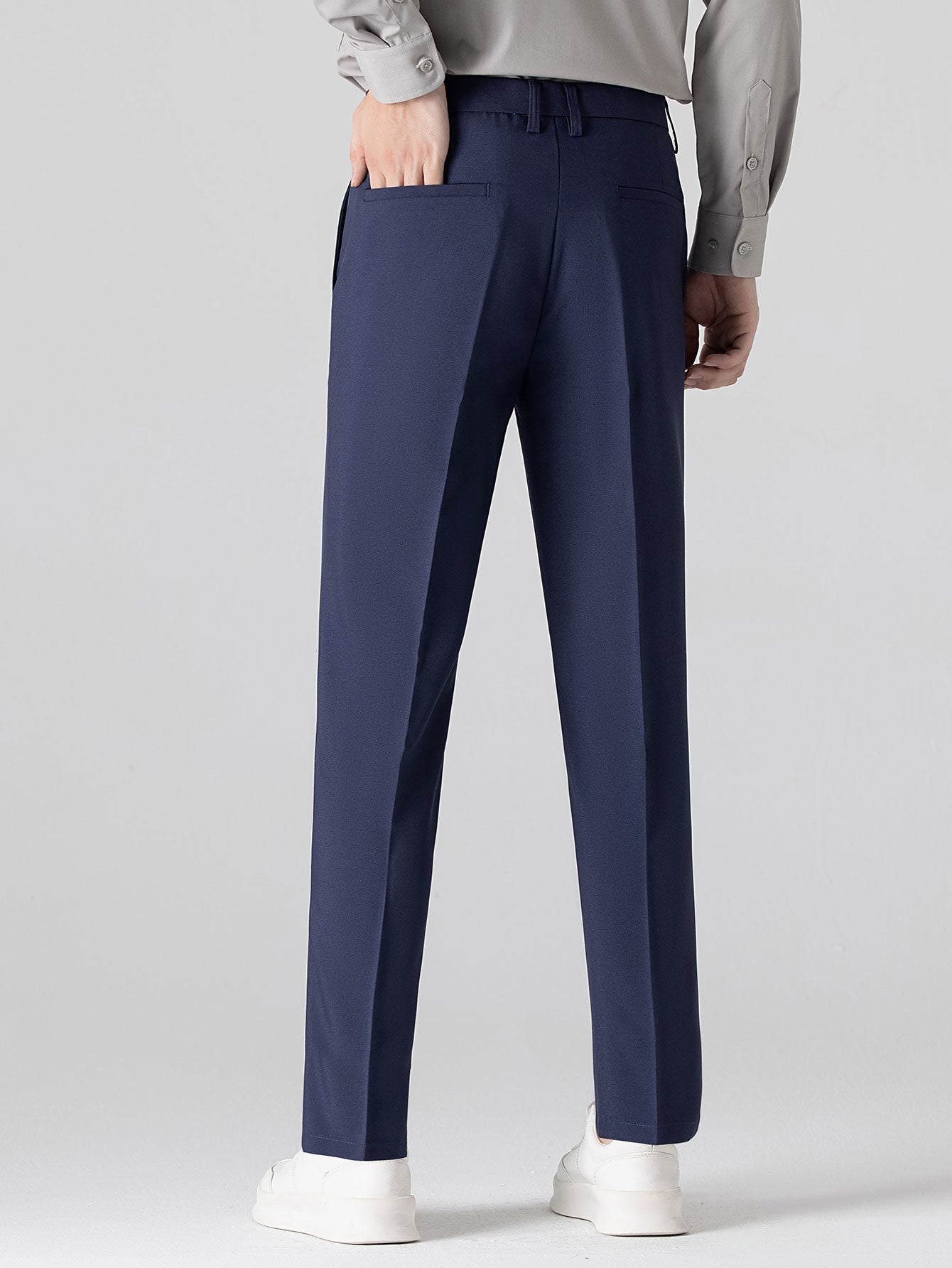 Slim Fit Tapered Trousers — North Row | Model Wearing